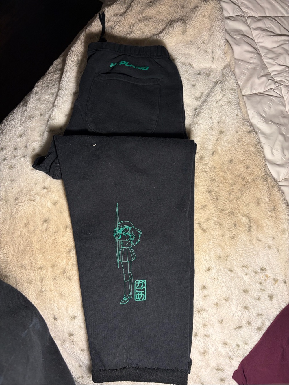 Black Men's Graphic Sweatpants with Teal Print